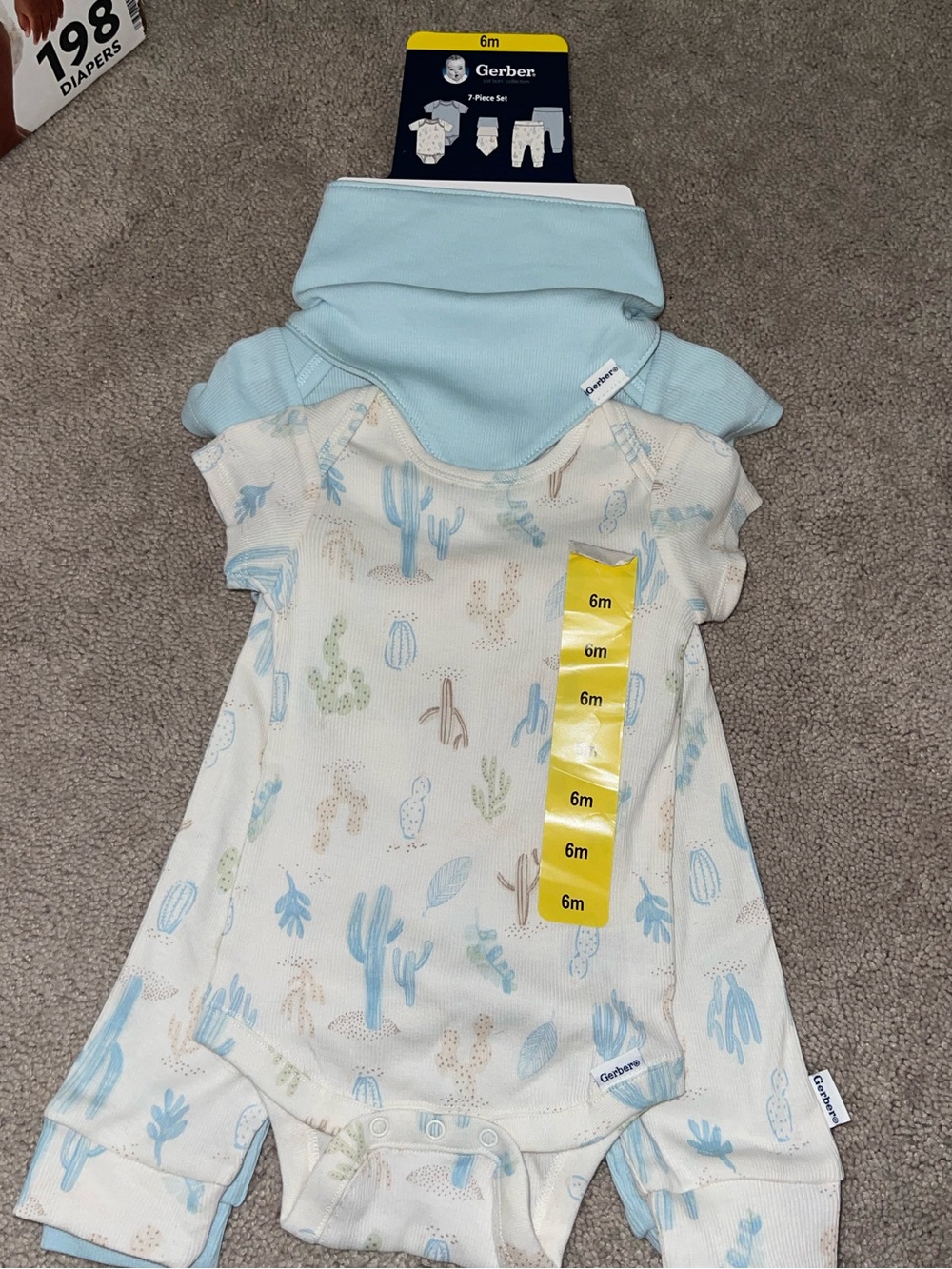 NWT Gerber 7-Piece Set - 2 bodysuits, 2 pants, and 3 bibs